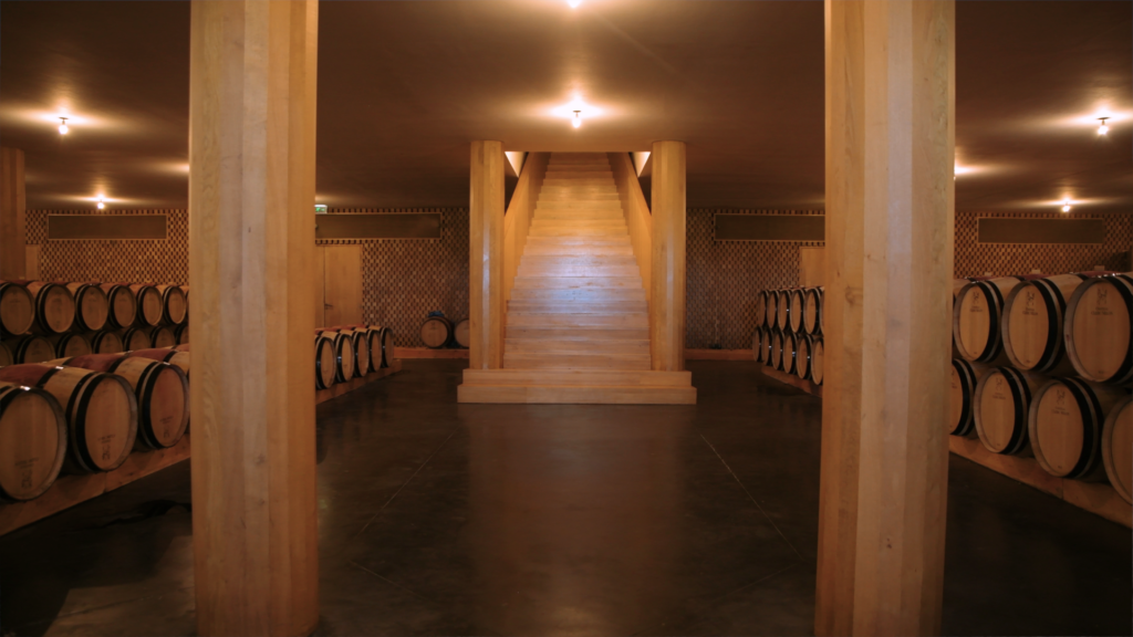 the barrel hall of Château Clerc Milon